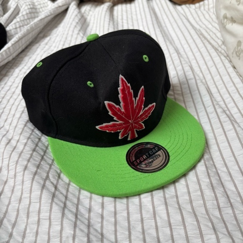 Black and Green Snapback Hat with Red Leaf